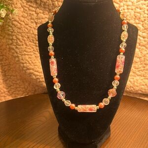 Lovely pink and silver tone beaded necklace with lobster and magnetic closures